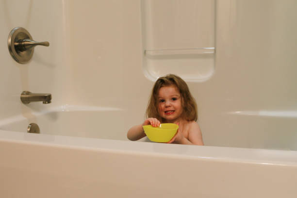 istock Girl in bathtub 1136283259