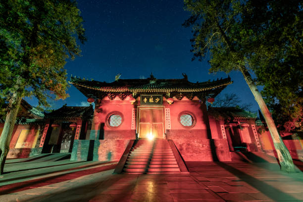 Starry Night View of Shaolin Temple The front door of Shaolin Temple with a plaque written Chinese script "Shaolin Temple" shaolin monastery stock pictures, royalty-free photos & images