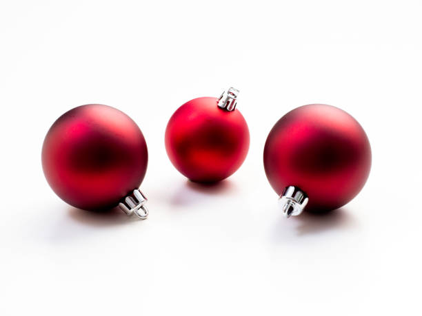 istock Red Christmas ornaments/baubles on a white background 1136286131
