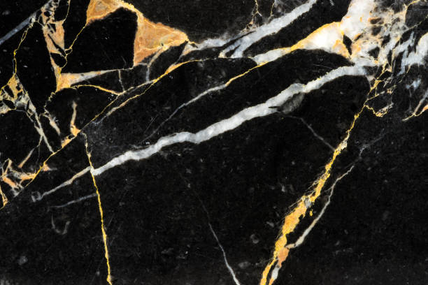 golden black marble with abstract pattern texture detail on high resolution interior design golden black marble abstract pattern texture luxury design veining stock pictures, royalty-free photos & images