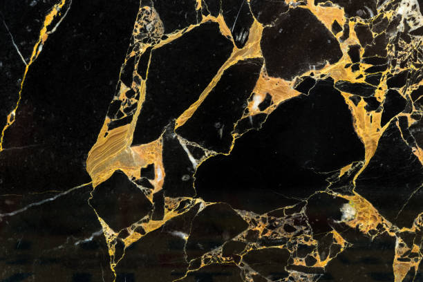 golden black marble with abstract pattern texture detail on high resolution interior design golden black marble pattern texture design luxury interior design backdrop background veining stock pictures, royalty-free photos & images