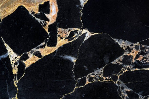 golden black marble with abstract pattern texture detail on high resolution interior design golden black marble with abstract pattern texture detail on high resolution interior design veining stock pictures, royalty-free photos & images