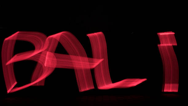블랙 배경 빨간색 발리 제목 붉은 빛 그림, 긴 노출 사진. - ferris wheel wheel night neon light 뉴스 사진 이미지