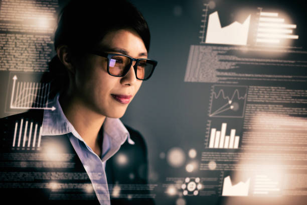 istock young business woman working and communicating at the office 1136295225