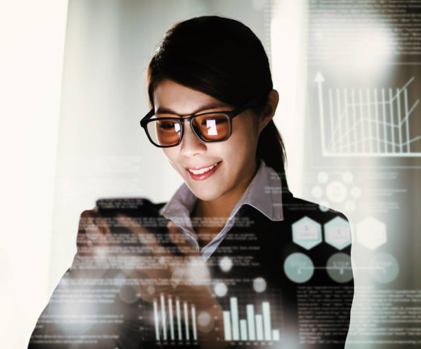 istock young business woman working and communicating at the office 1136295248