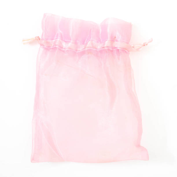 istock pink silk pouch to hold jewelry isolated 1136296748