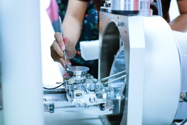 istock Scientist is preparation of nanomaterials for Scanning Electron Microscope (SEM) machine in laboratory 1136304145