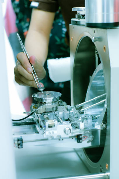 istock Scientist is preparation of nanomaterials for Scanning Electron Microscope (SEM) machine in laboratory 1136304149
