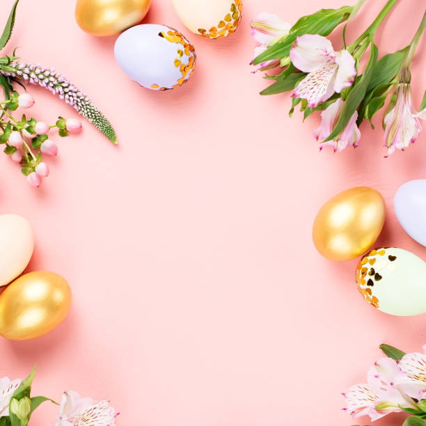 istock Festive Happy Easter background with decorated eggs, flowers, candy and ribbons in pastel colors on pink. Copy space 1136304367