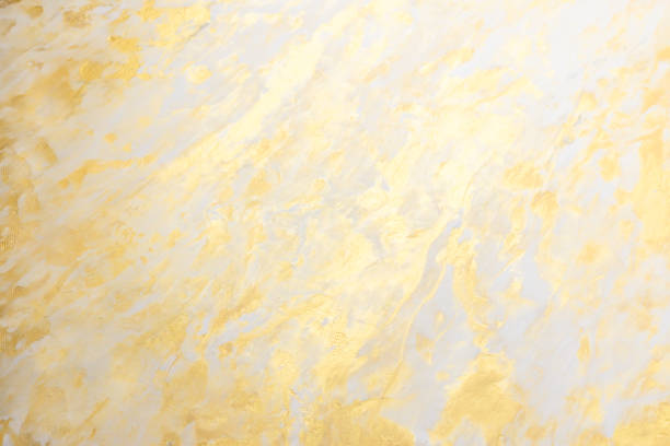 istock Abstract golden textured hand painted background closeup 1136304941
