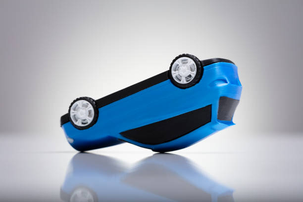Top view of a Blue toy car on a blue background with long and side shadow.