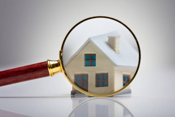 istock House Model Seen Through Magnifying Glass 1136317153
