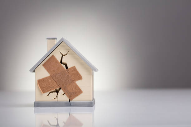 istock House Model With Crossed Band Aid 1136317161