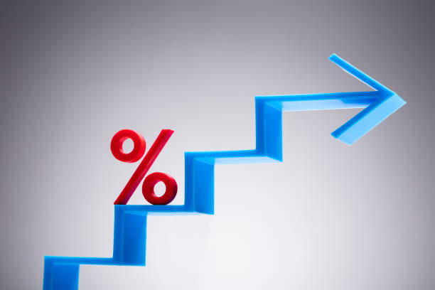 istock Percentage Sign On Blue Arrow 1136317367