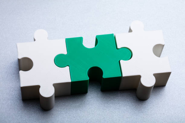 istock Jigsaw Puzzle Block On White Textured Background 1136317643