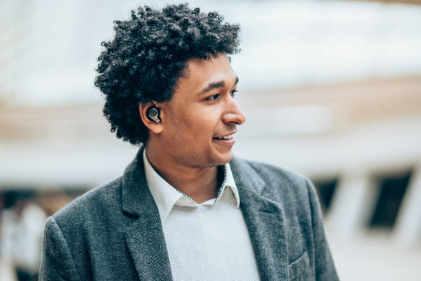 istock Portrait of modern man with Wireless earbuds 1136317962