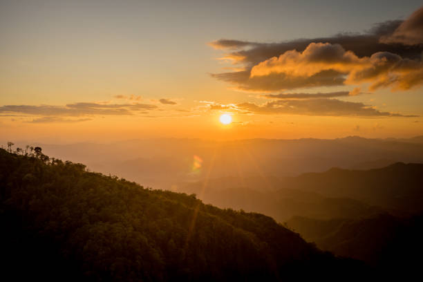 istock Sunset behind the mountain at Doi Thule, Tak, Thailand 1136321827