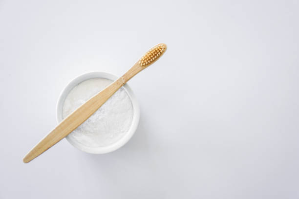 istock Wooden toothbrush with powder 1136321987