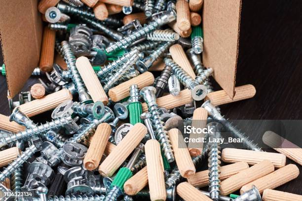 Open Box With Fall Out Tools For A Furniture Assembly Closeup Stock Photo - Download Image Now