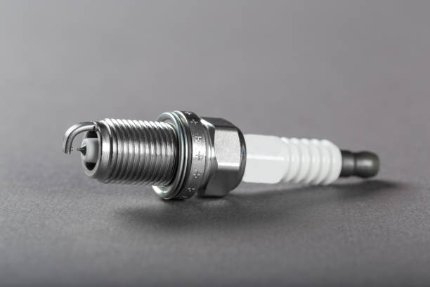istock Spark plugs on black background, shallow depth of field 1136329159