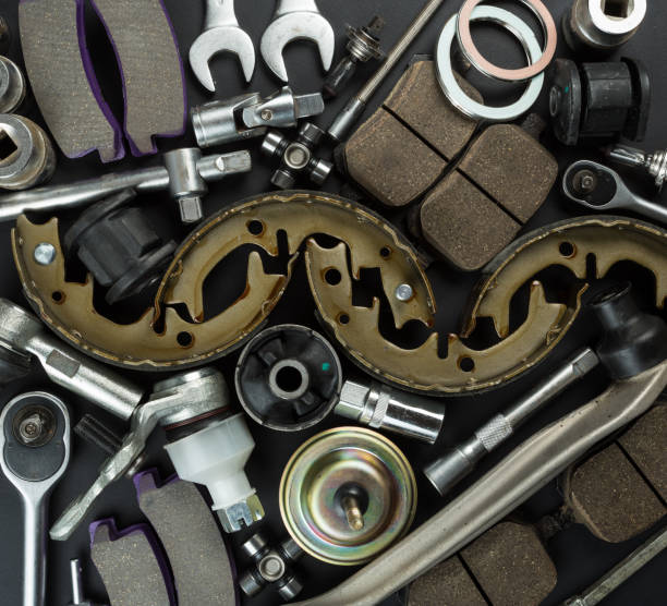 istock Various Car parts on dark background 1136329557