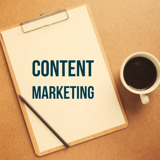 istock Content marketing word on clipboard with cup of coffee 1136332236