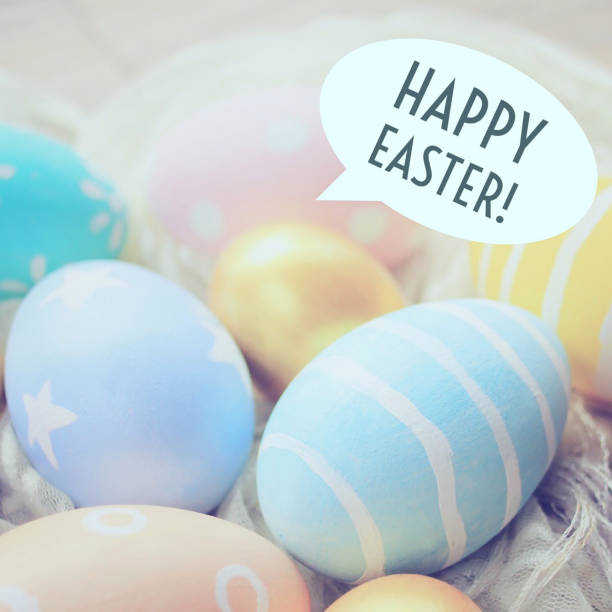 istock Pastel and colorful easter eggs with happy easter word in speech bubble 1136332617