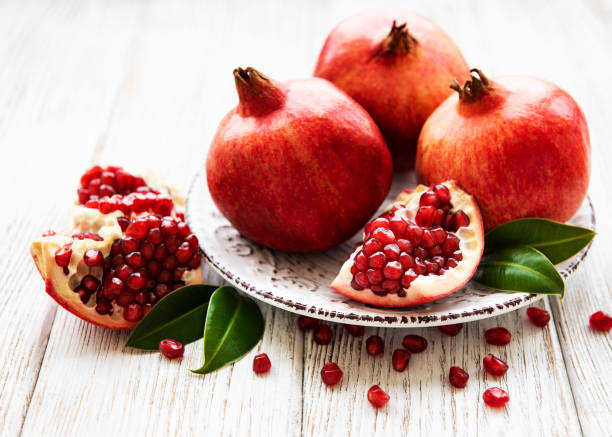 istock Juicy and ripe pomegranates 1136335616