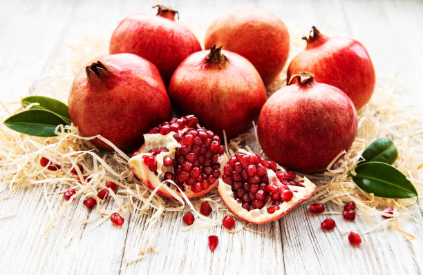 istock Juicy and ripe pomegranates 1136335621