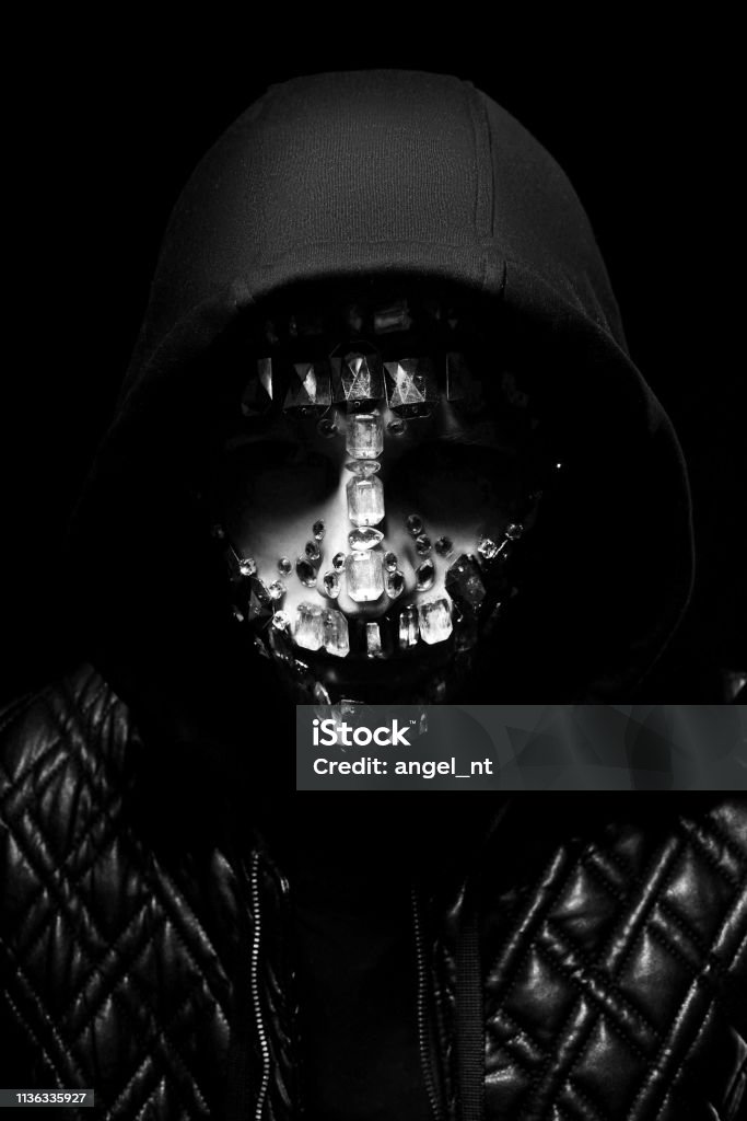 Art Portrait Of A Hooded Man With Big Rhinestones On His Face