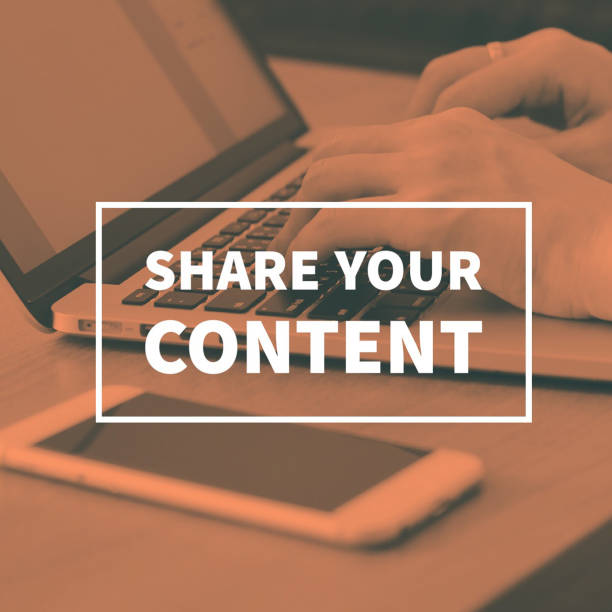 istock Share your content concept photo, hands using laptop background 1136337195