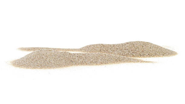 istock Pile of sand isolated on a white background 1136338905