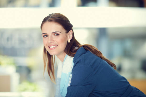 Portrait of a confident young businesswoman working in a modern office