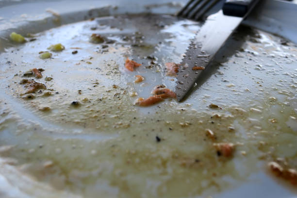 istock knife on messy dish, bangkok, thailand 1136340187