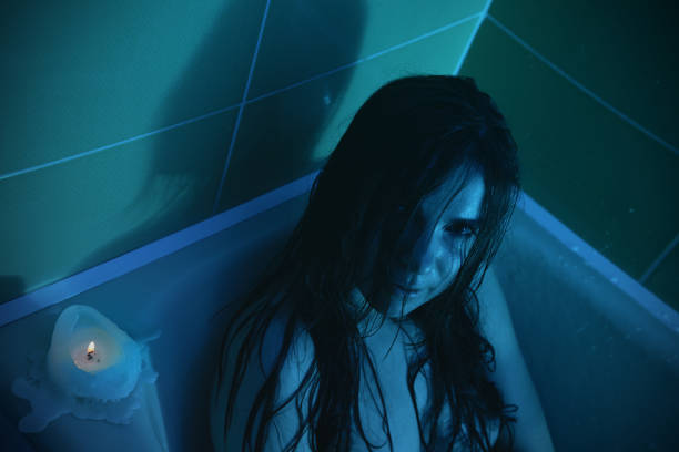 istock Young woman washing in bath at home. 1136342461