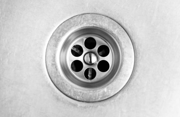 istock Drain hole in metal sink. Close up 1136343598
