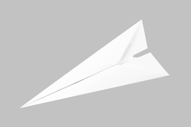 istock White paper airplane. Top view. Close up. Isolated on black background 1136343609