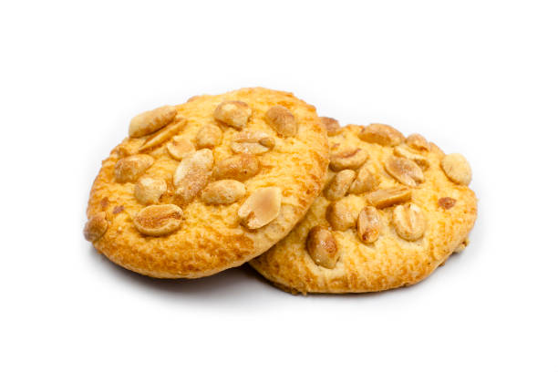 istock Peanut cookies isolated on white background. Crunchy cookies with peanuts 1136343716