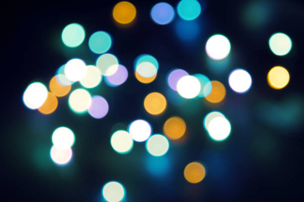istock Abstract bokeh nigth background. Colorful magic lights background, decoration for the party. Neon light glowing effect. Blue glow 1136343839