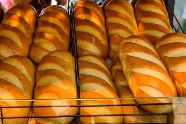 istock Long loafs on a shelves in supermarket 1136345141