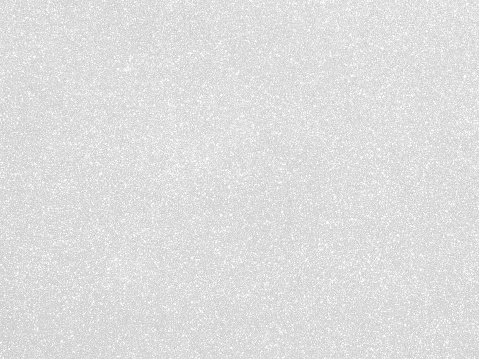 Shiny silver color foil glitter decorative texture paper: Bright brilliant festive metallic textured empty wallpaper backdrop: Tin metal material for holiday craft design decoration
