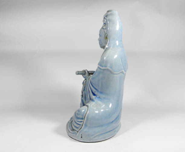 istock Guanyin Old Asian White Background 1136348164