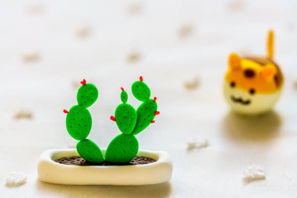Colorful rubber cactus and cat