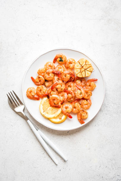 istock Roasted shrimps with lemon, garlic 1136358085