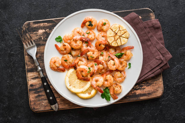 istock Roasted shrimps with lemon, garlic 1136358169