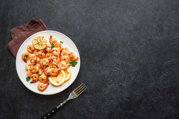 istock Roasted shrimps with lemon, garlic 1136358197