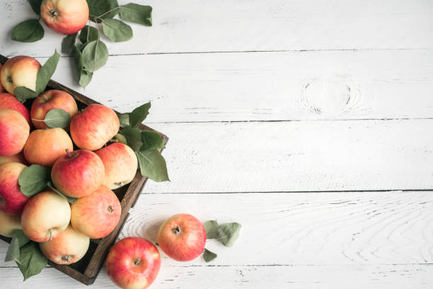 istock Red apples in wooden box 1136358398