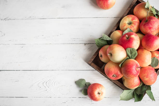 istock Red apples in wooden box 1136358413