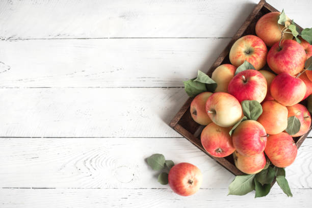 istock Red apples in wooden box 1136358921