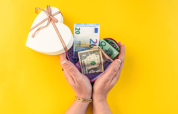 istock paper money inside heart gift box 1136359650